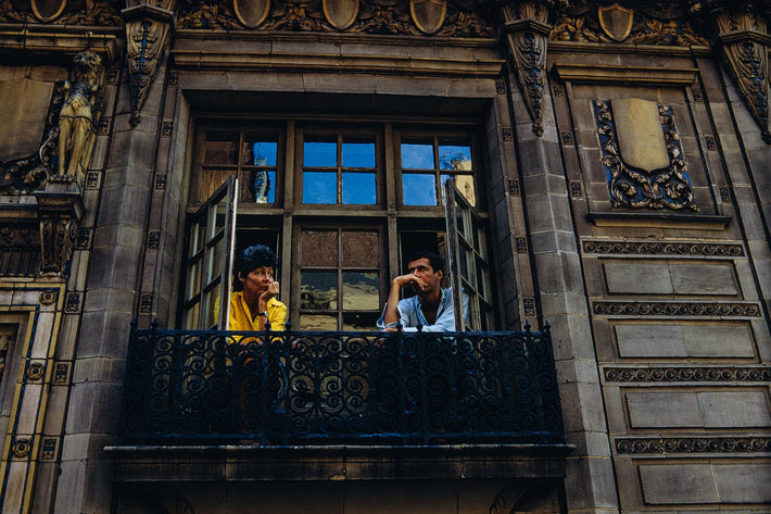 Two People in Window, Unknown Locale, Italy