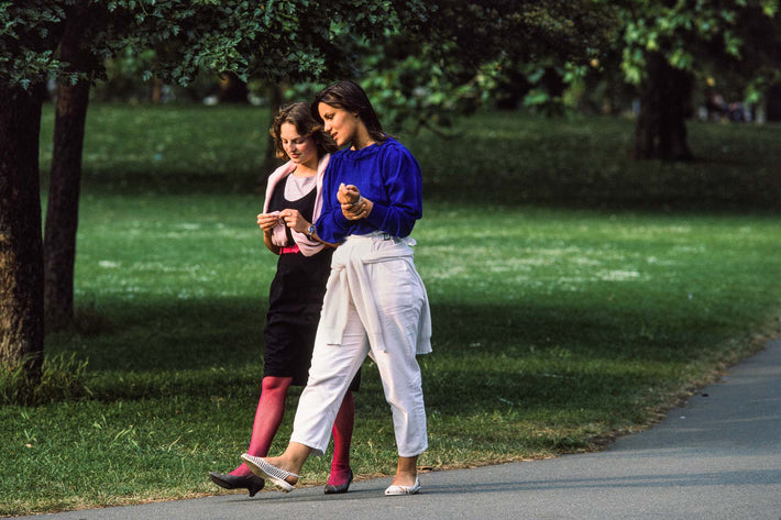 Two Young Girls Talking, Walking, London
