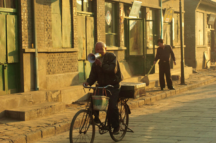 Man on Bike with Megaphone, Pingyao