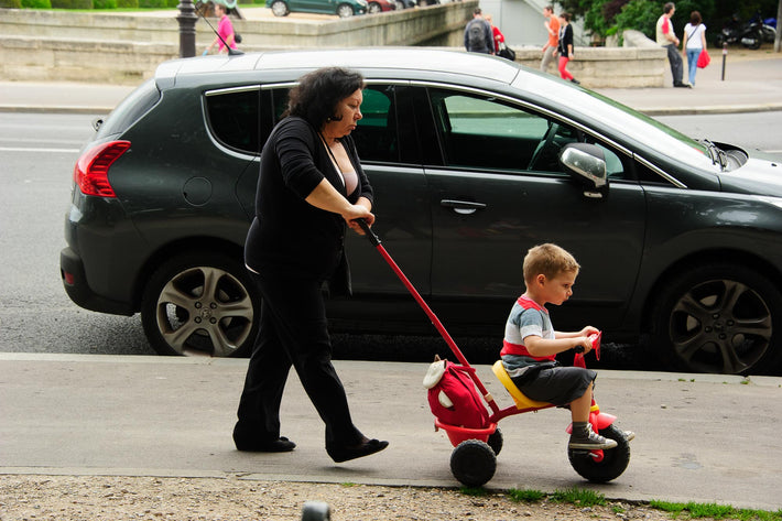 Woman Pushing Kid, Paris