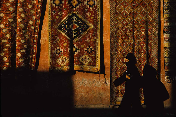 Waling In Front of Wall with Carpets, Marrakech