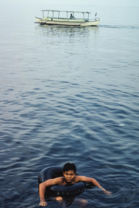 Boy in Water, Boat, Philippines