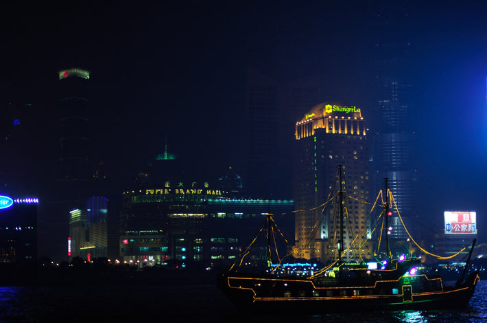 Boat Lit Up Yellow in City, Shanghai