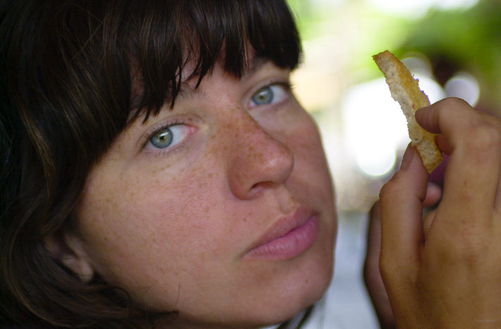 Close-up Girl with Bread Looking at Me, Tuscany