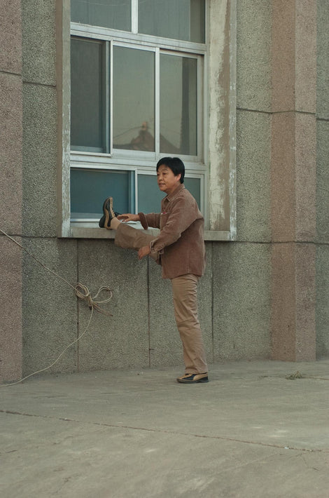 Man with Leg Up, Pingyao
