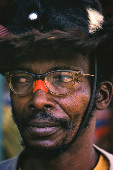 Man with Red Tape on Glasses, Jamaica