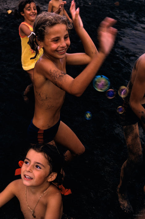 Kids at Black Sand Beach, Rome