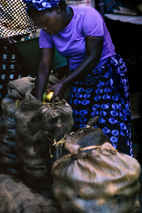 Woman in Blue with Yellow Fruit, Liberia