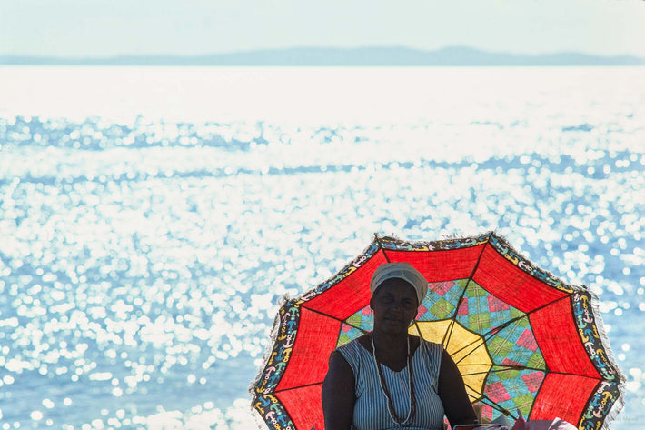 Woman With Umbrella, Water in Background, Bahia