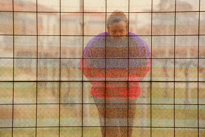 Man Peering Through Screen, Vicenza