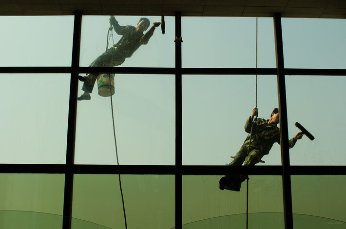 Two Men Cleaning Windows at Airport, Beijing