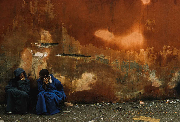 Two Men Sitting Against Wall, Marrakech