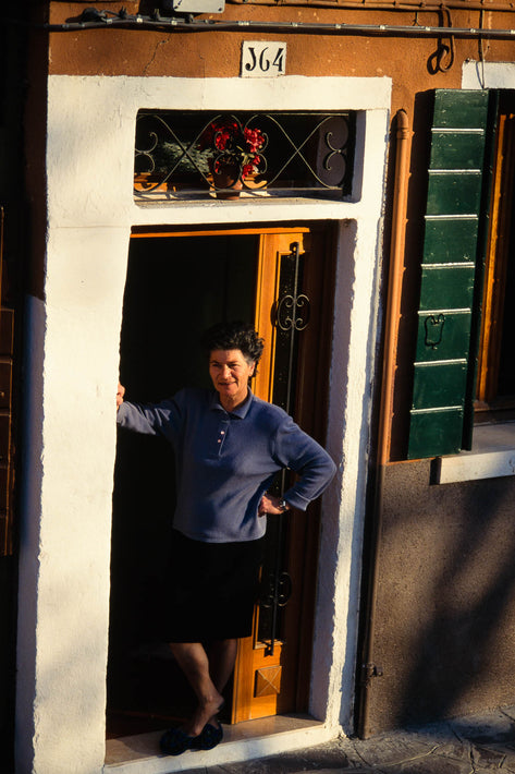 Woman in Doorway in Blue Top, Burano