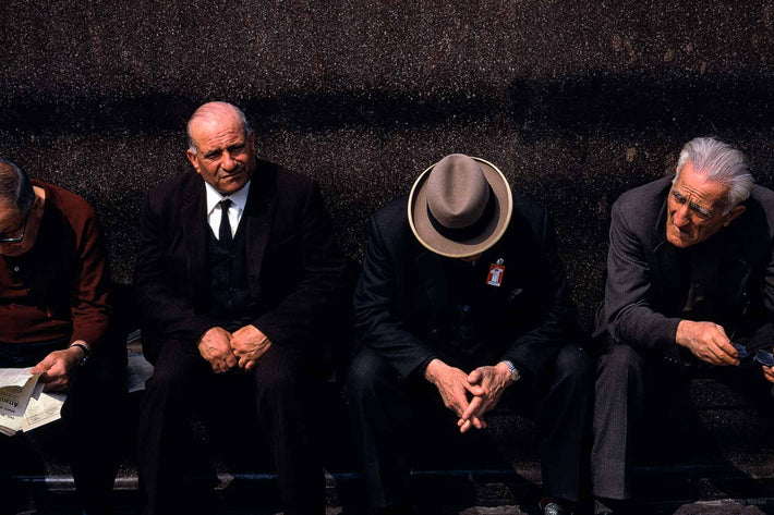 Three men, One with Hat, Milan