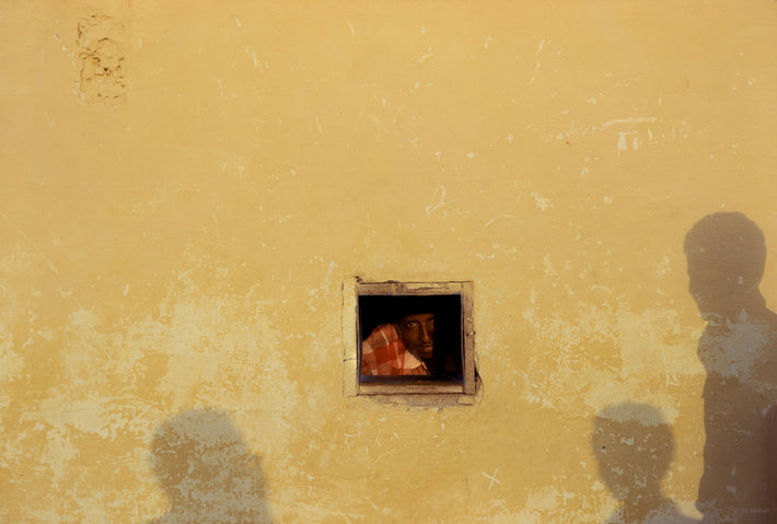 Man in Small Window with Shadow, Somalia