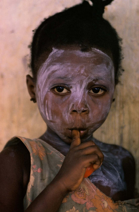 Painted Child with Finger in Mouth, Liberia