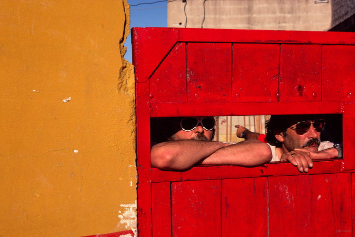 Two Men in Red Door, Yellow wall, Watching, Arles