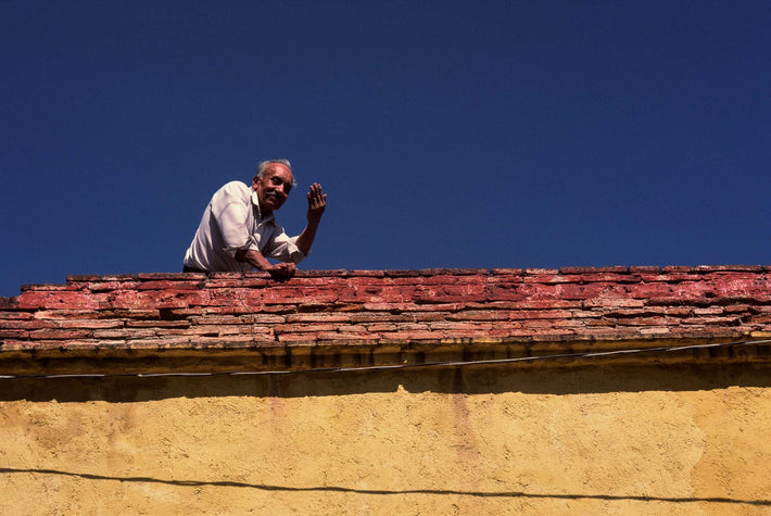 Man Waving from Rooftop, Oaxaca