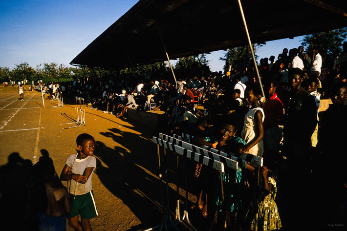 Young Boy In Front of Stands, Ghana