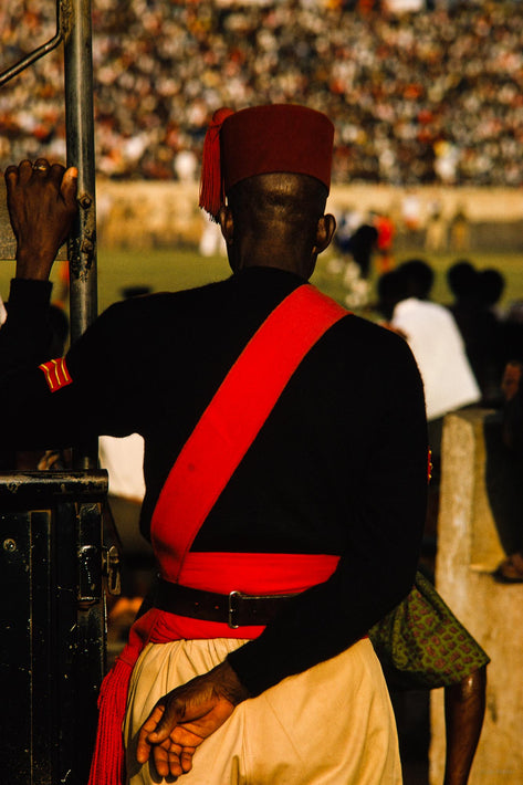 Man with Red Sash in Focus, Ghana