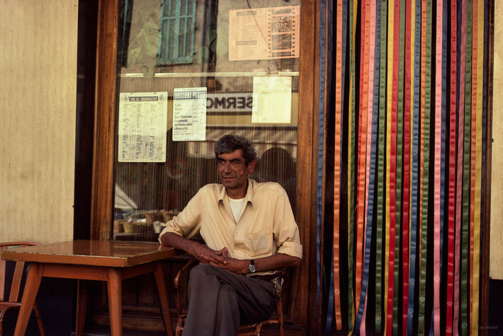 Man at Cafe, Colored Ribbon, France