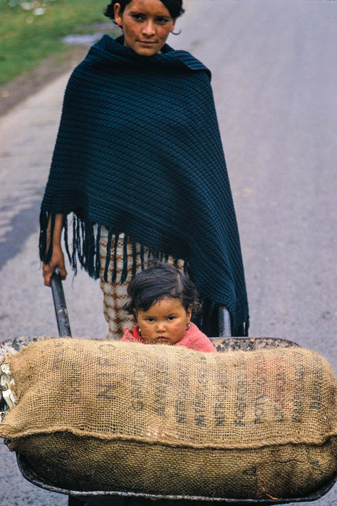 Woman with Child in Wheelbarrow, Colombia
