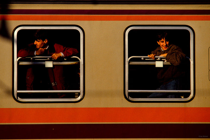 Two Guys in Train Windows, Pisa, Italy
