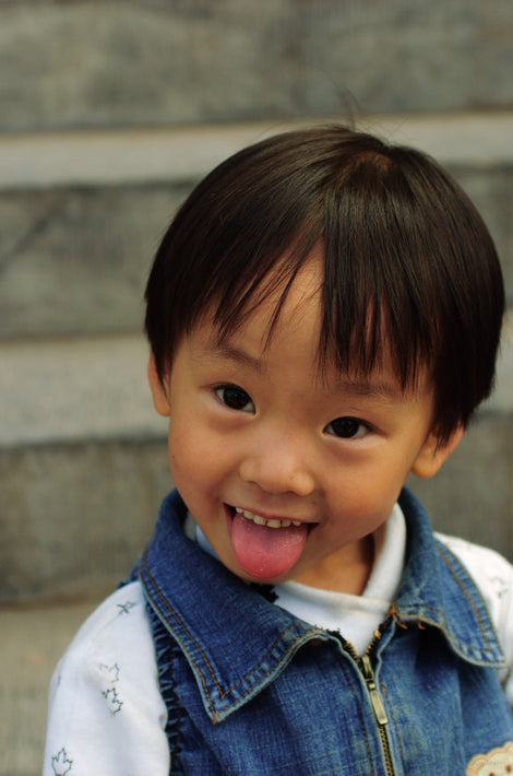 Young Boy with Tongue Out, Pingyao