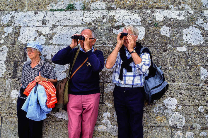 Three People, Two with Binoculars, Cowes, England