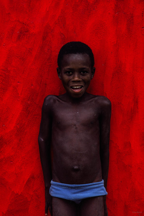 Young Boy, Blue Trunks, Red Red Wall, Bahia