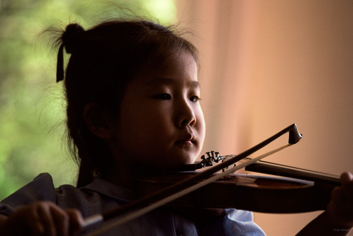 Closeup of Child Playing Violin, Kamakura