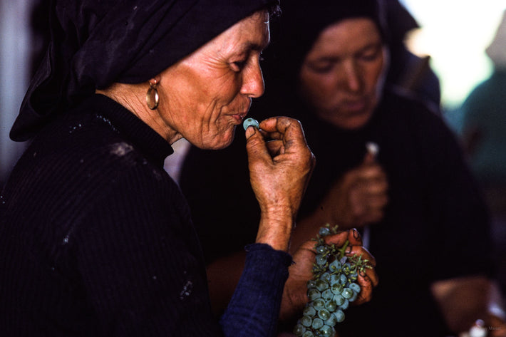 Woman with Grape to Mouth, Portugal