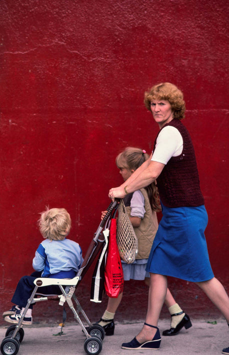 Red Wall, Woman with Two Kids, Ireland