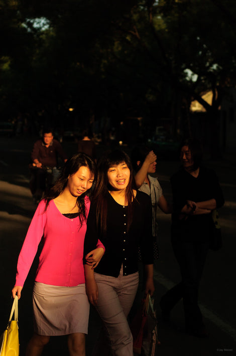 Two Young Women Walking in Light, Beijing