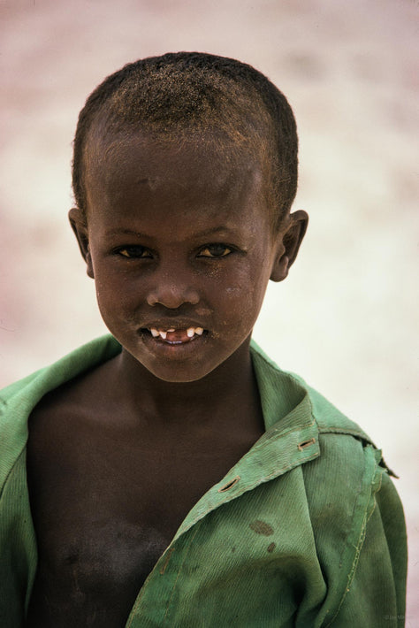 Young Boy in Green, Missing Teeth, Somalia