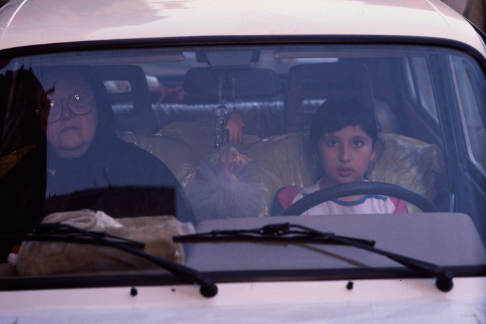 Older Woman and Young Girl in Car, Egypt