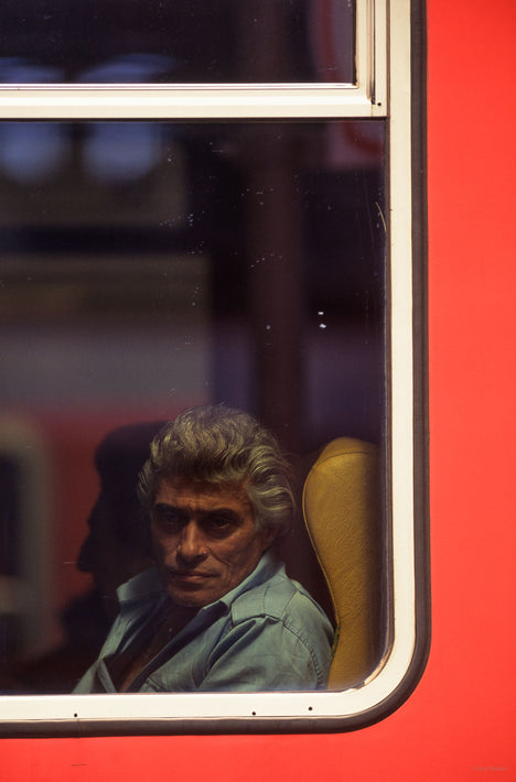 Man with Grey Hair in Train Window, Milan