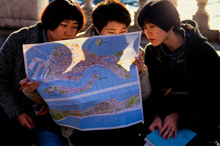 Three Tourists with Map, Venice