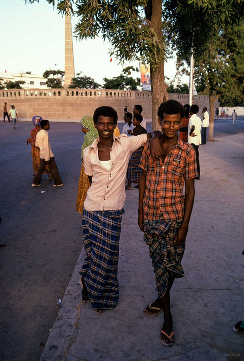 Two Young Men Posing, One with Arm on Shoulder, Somalia