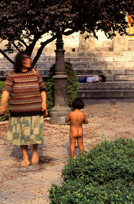 Mother and Naked Kid in Park, Spain