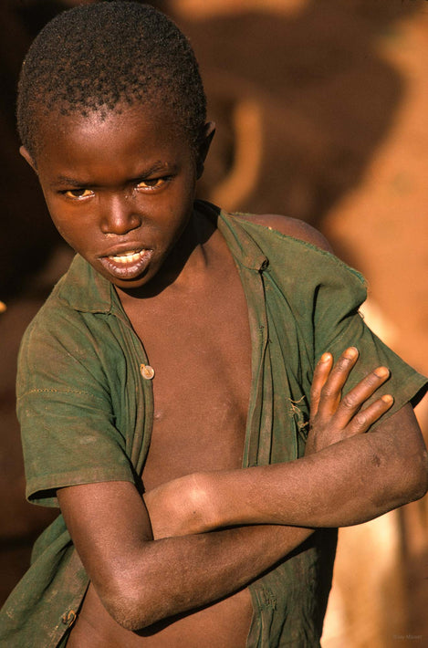 Boy in Green Shirt, Arms Folded, Kenya