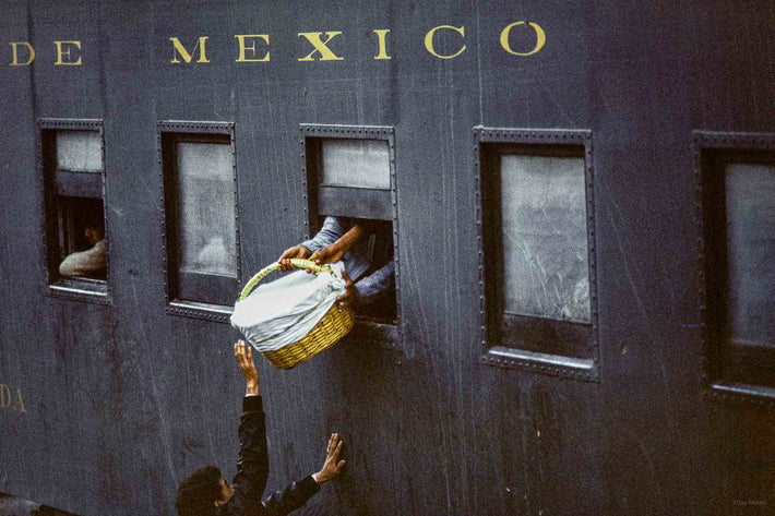 Handing Basket to Train, Oaxaca