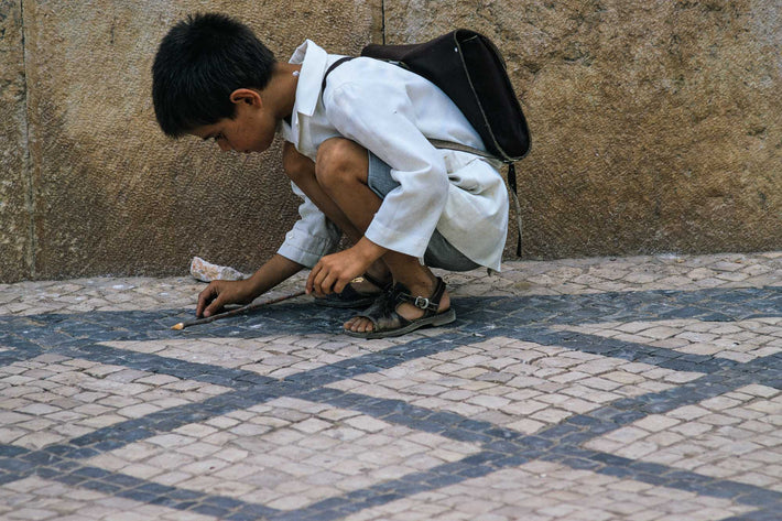 Boy Kneeling in White, Portugal