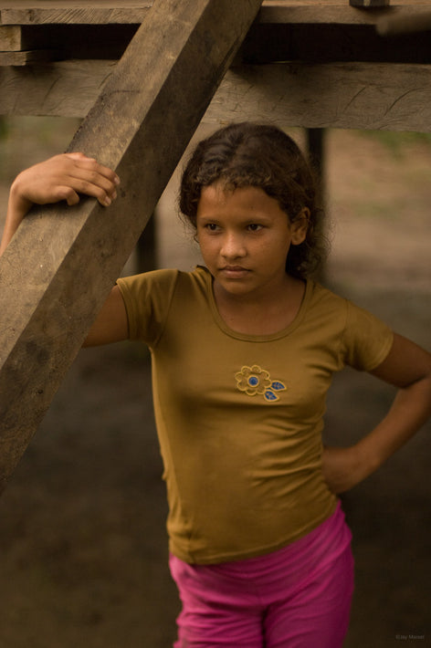 Young Girl Holding Beam, Amazon, Brazil