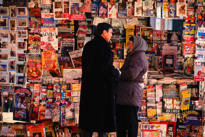 Man and Woman at Newsstand, Venice