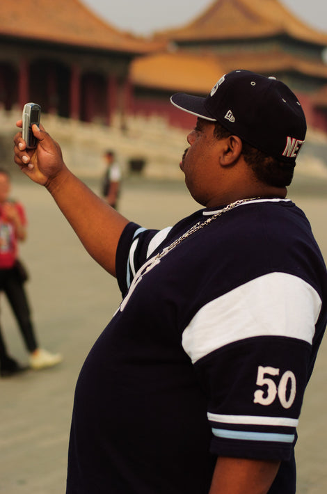 Man Taking Photo with Phone, Beijing