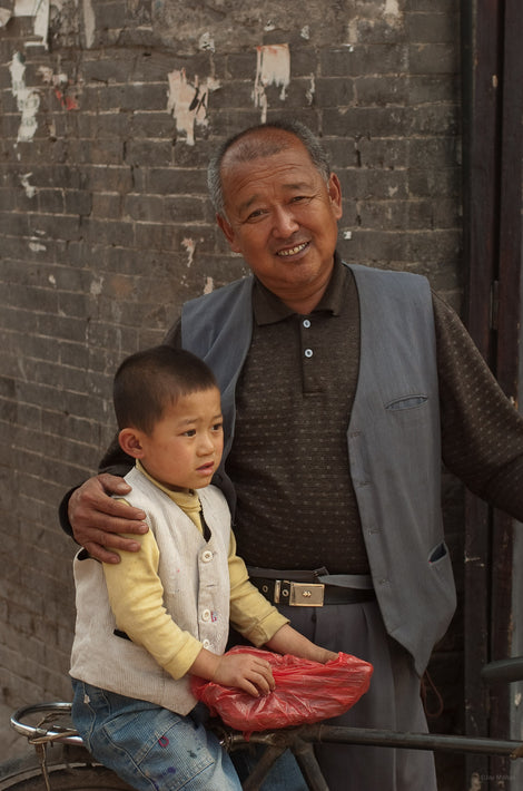 Man with Arm Around Child, Pingyao
