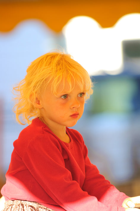 Blonde Child at Fair, Maine