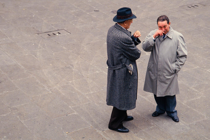 Overhead Two Men, One with Hands to Nose, Vicenza