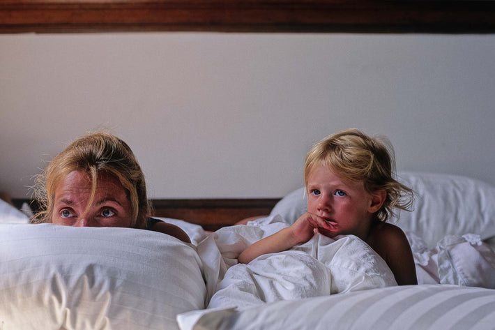 With Mom in Bed Watching TV